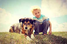 Child with dog - Kinder- und Jugendhaus Funk