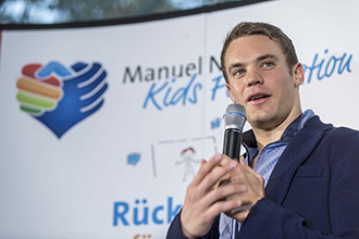 Manuel Neuer gives an interview at an event of the Manuel Neuer Kids Foundation