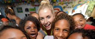 Kindernothilfe e.V. Lena Gercke take a picture with children