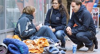 Street worker talking with a street kid